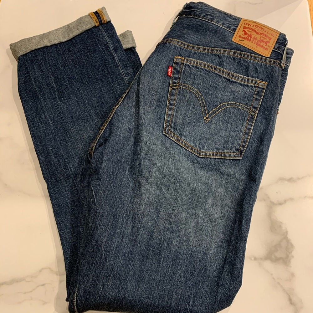 Levi’s 501 high waist button fly distressed jeans